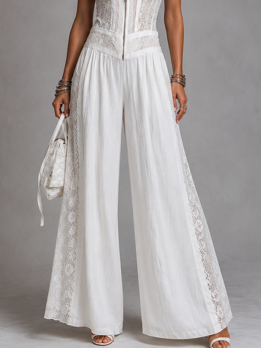MAGDALENA · Tuta vintage a collo alto e gamba larga