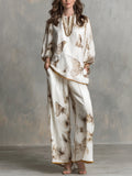 CELINE | Completo Due Pezzi in Raso Color Avorio con Stampa Farfalle e Pantaloni Ampi