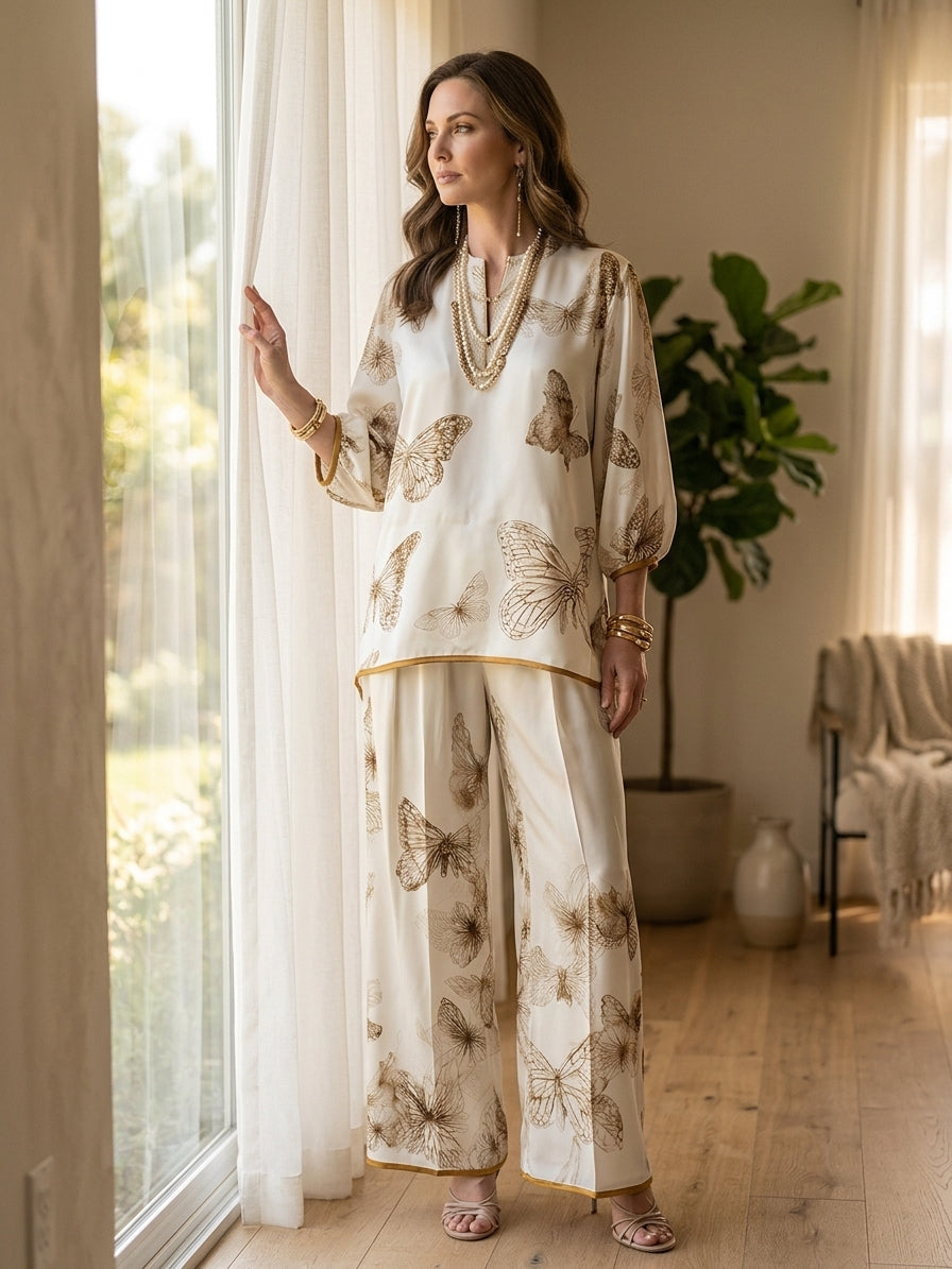 CELINE | Completo Due Pezzi in Raso Color Avorio con Stampa Farfalle e Pantaloni Ampi