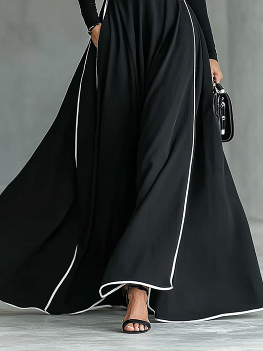 MARTINA | ABITO MAXI NERO CON CUCITURE BIANCHE E COLLO ALTO