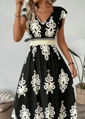 Candela - Vestido maxi barroco con escote en V